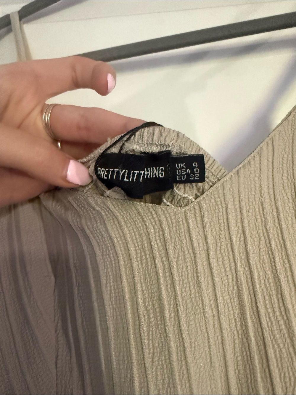 PrettyLittleThing Beige Pleated Spaghetti-Strap Romper with Pockets - Picture 3 of 4